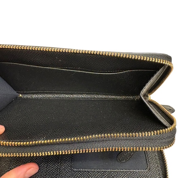 Coach black embossed leather double zipper clutch wristlet wallet
